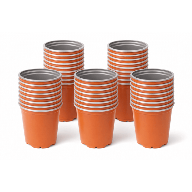 Stacks of orange cups with gray bases on a white background