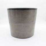 Gray textured flower pot on a white background