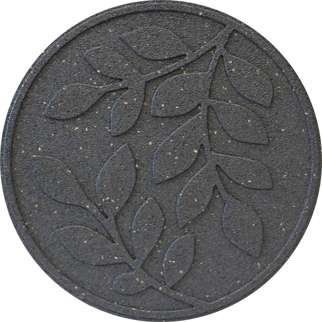 A round grey stepping stone with a leaf pattern design.