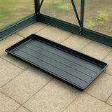 grow bag tray in greenhouse