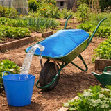 Blue wheelbarrow being filled with water from a blue bucket in a garden setting.
