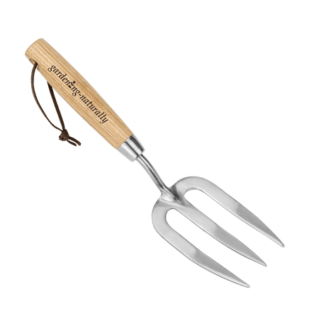 Gardening fork with wooden handle on a white background