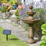 water fountain in pretty garden sat on a path