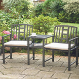 Two cushioned chairs on a patio, inviting relaxation and comfort in an outdoor setting.
