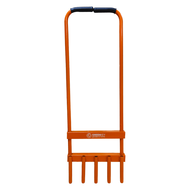 Orange garden rake with a black handle on a white background