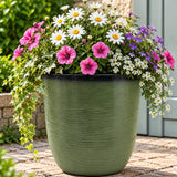 Light green pot with flowers inside