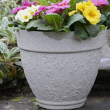 Floral Sandstone Plant pot with colourful flowers