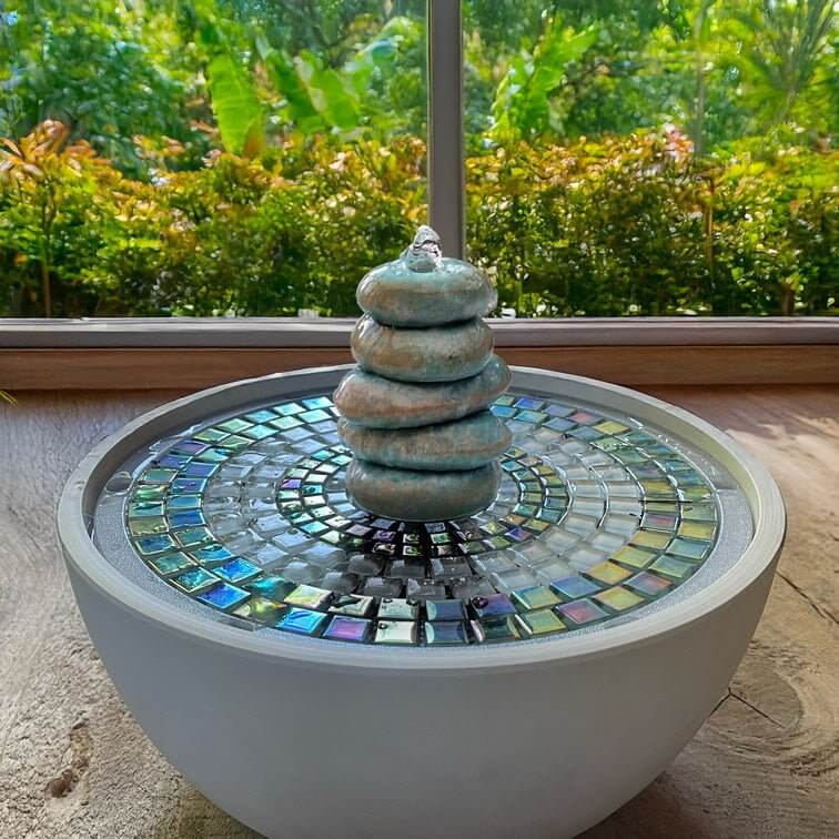 Decorative fountain with mosaic base 