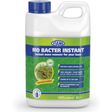 A 2 litre bottle of Mo Bacter Instant moss remover with a label featuring grass.