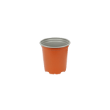 Orange plastic cup with a gray lid on a white background