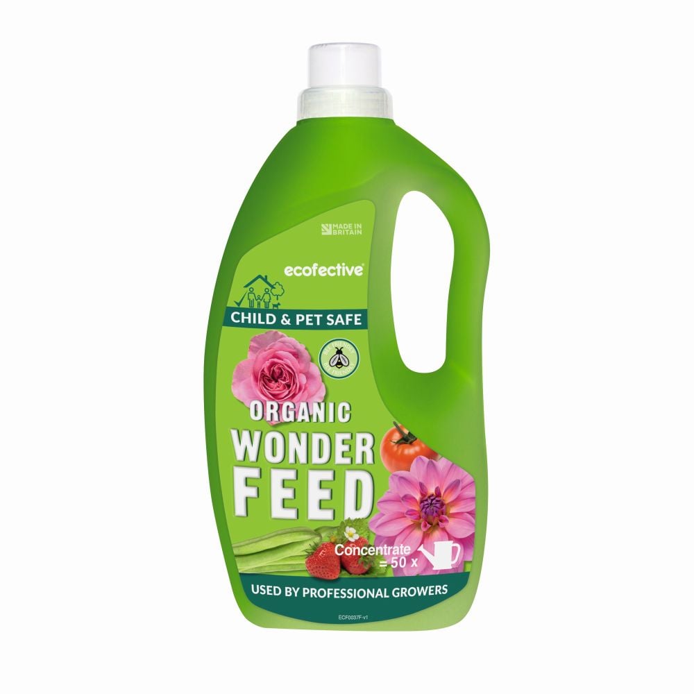 A bottle of Ecofective Organic Wonder Feed plant food concentrate with floral design and product information printed on the label.