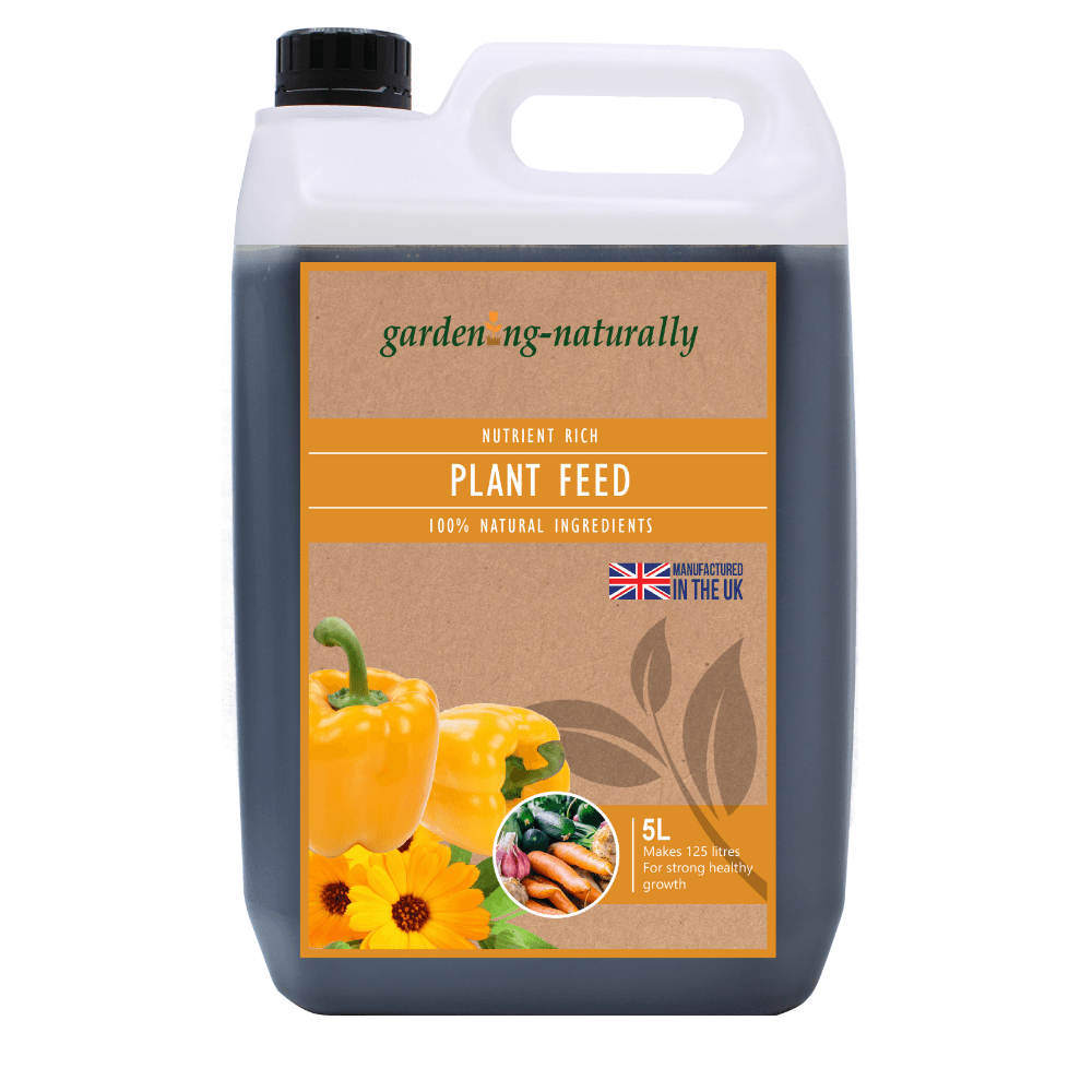 A 5L plastic jug of gardening naturally Plant Feed, featuring a white handle and cap, a dark gray container, and a brown kraft-paper style label with yellow bell pepper and carrot illustrations.