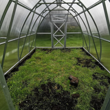 inside of polytunnel in garden setting arrow