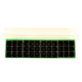 Seedling tray with multiple compartments on a white background