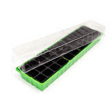 Green seedling tray with clear lid on a white background