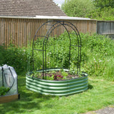 sage green raised bed in garden