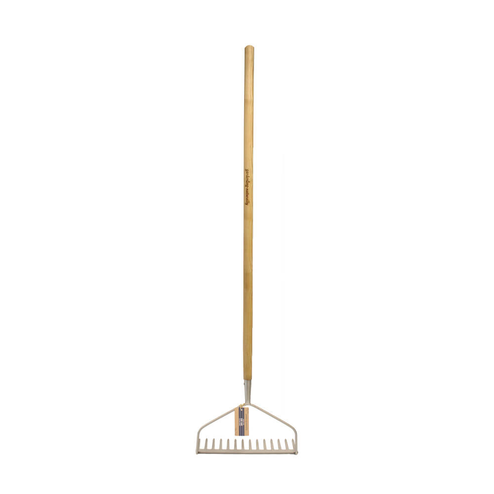 Metal garden rake with wooden handle on a white background