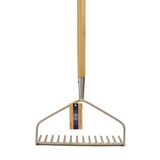 Garden rake with wooden handle on a white background