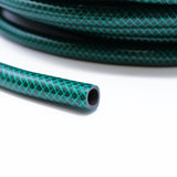 Garden hose reinforced with natural background
