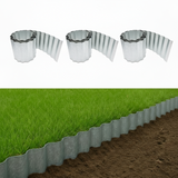 3 rolls of garden edge borders on grass