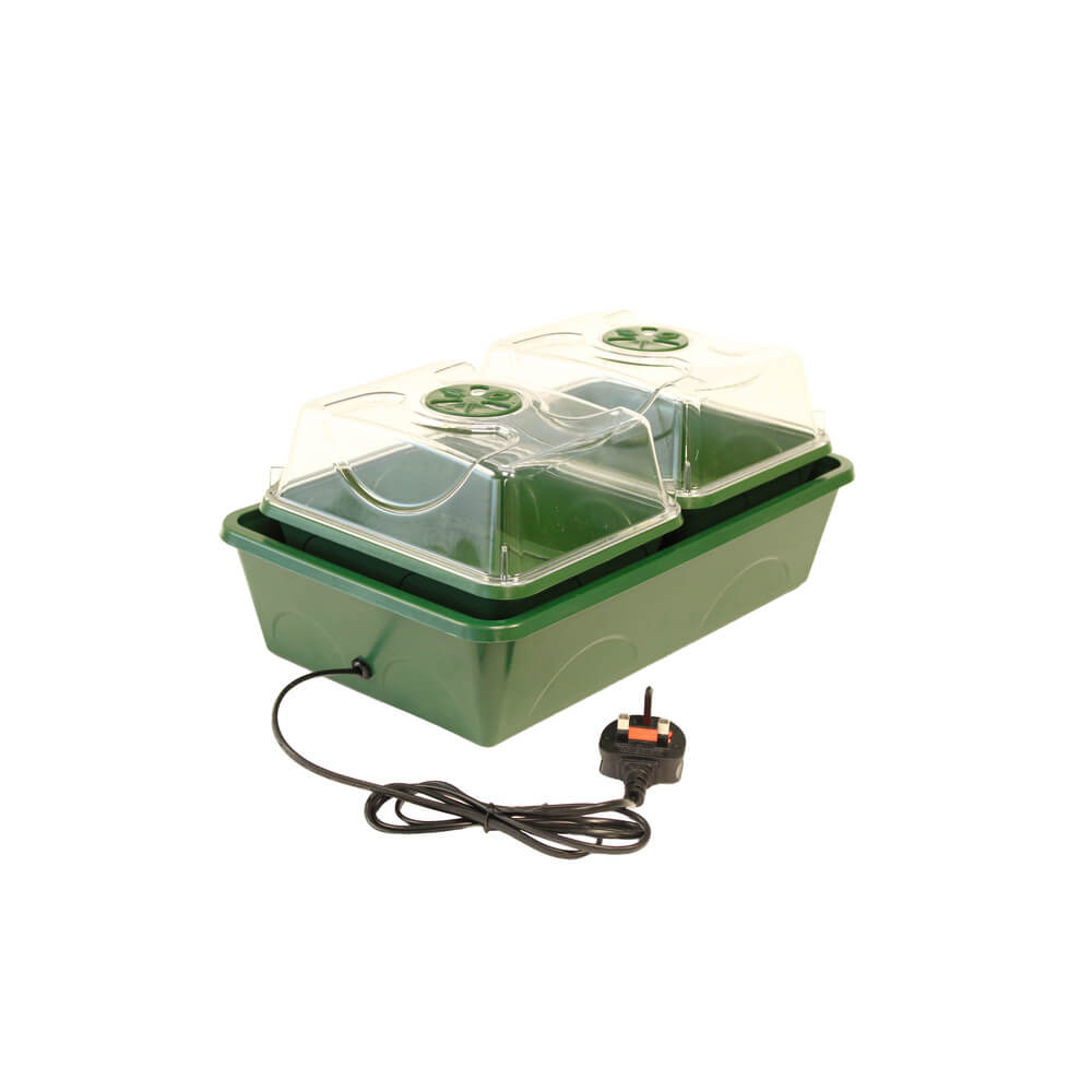 Green and clear propagator with power cord on a white background