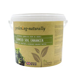 Container of granulated seaweed soil enhancer from Garden Naturally in various sizes, labeled for garden use.