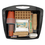 A gardening starter kit organized inside a black plastic storage tote. The kit includes terracotta-colored pots, brown paper seed-starting trays, a bag of compost, wooden plant markers, a metal scoop, a green-handled pencil, and other small gardening tools, all on a plain white background.
