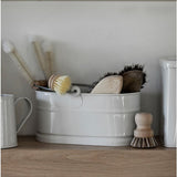 Metal bucket with handle with brushes in it