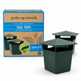 Slug traps with packaging labeled 'gardening.naturally' on a white background