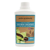 A 500ml white plastic bottle of garden-ng-naturally Slug Brew Concentrate, featuring a brown and teal label with a slug illustration and leaf graphics.