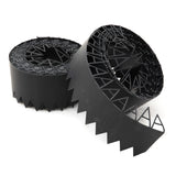 Rolls of black flexible lawn edging with a zigzag design, including securing pins.