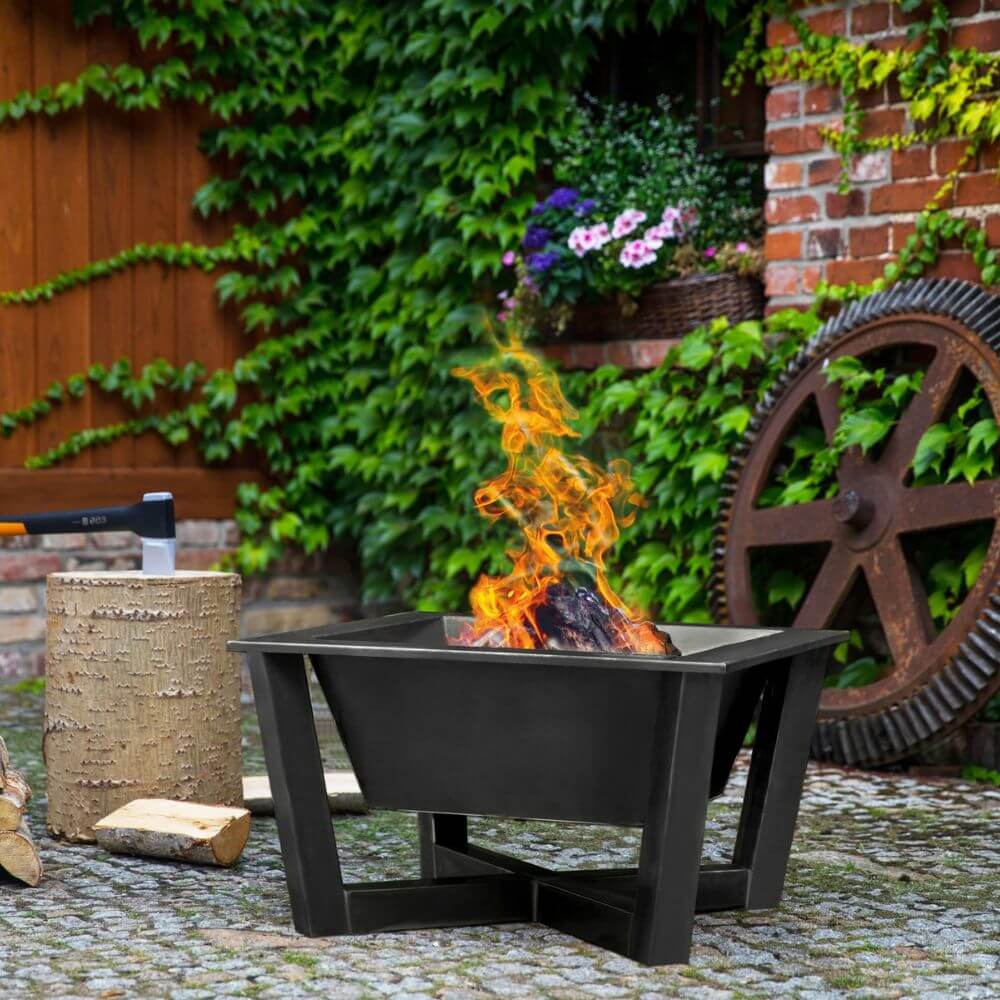 garden fire pit in corner of courtyard garden