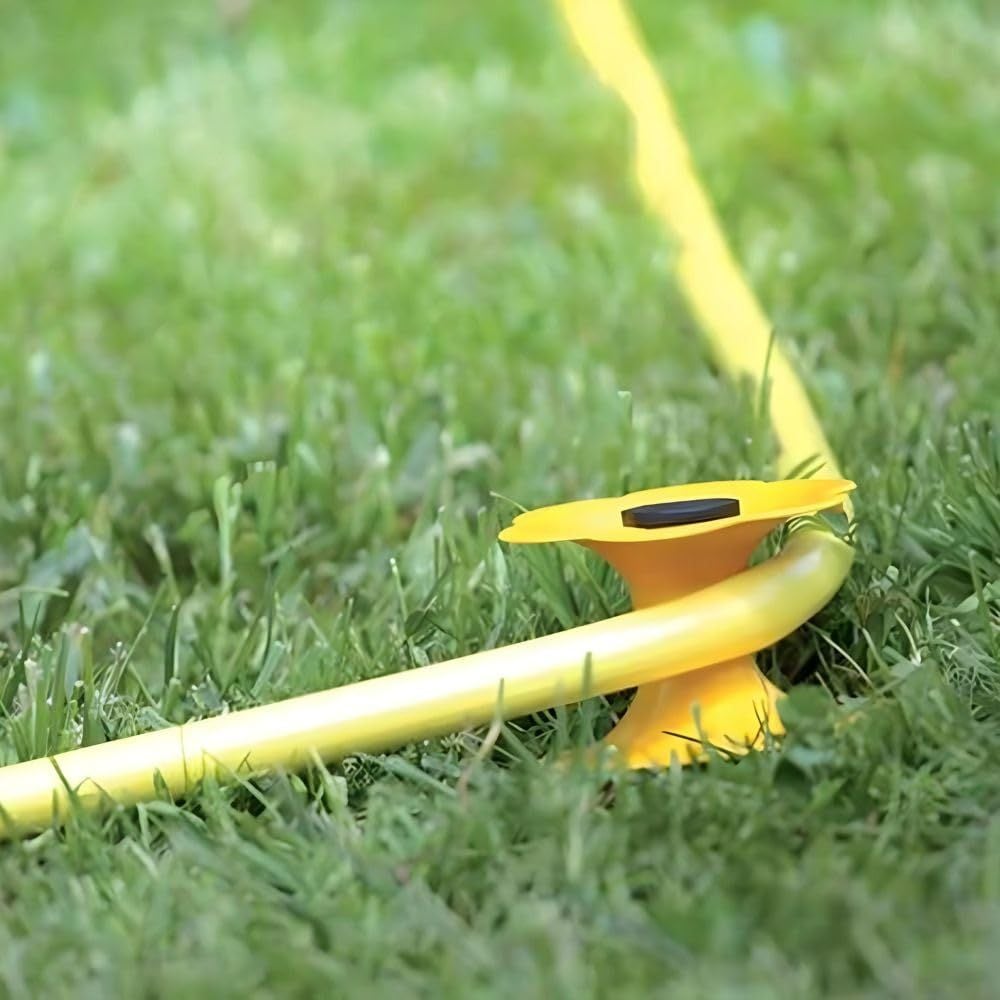 yellow hose transporter in garden