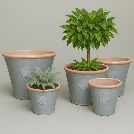 light grey plant pots with peach coloured tops