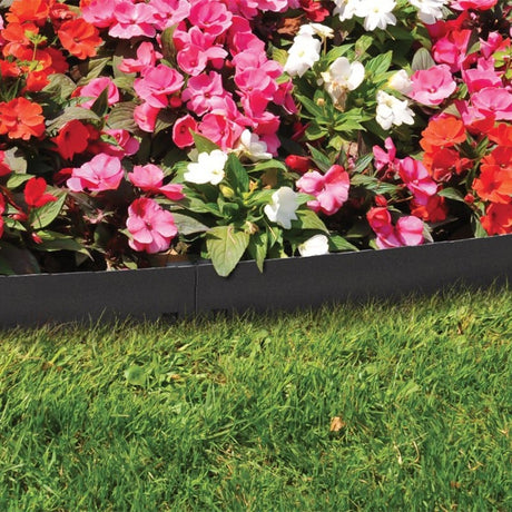 Lawn border straight edge with flowers on one side and grass on the other