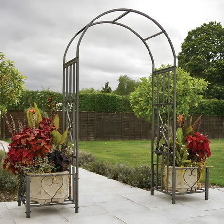 Huntingdon Ornamental Arch with Planter Holders that are filled with flowers and plants