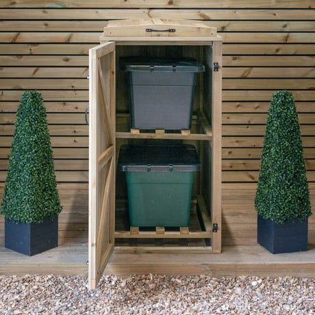 Storage cabinet with two bins and a potted plant