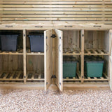 A wooden storage cabinet with two doors and two bins