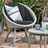 padded chair from bistro set with a pillow for extra comfort