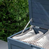 Blue outdoor storage box with pillows and lid