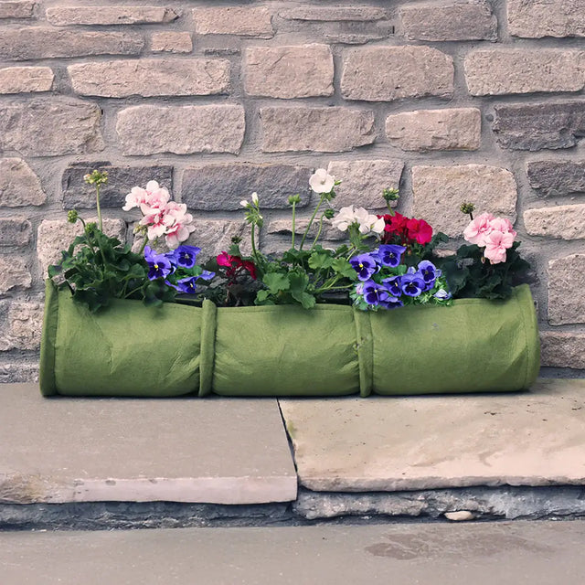 Vigoroot plant tube filled with flowers