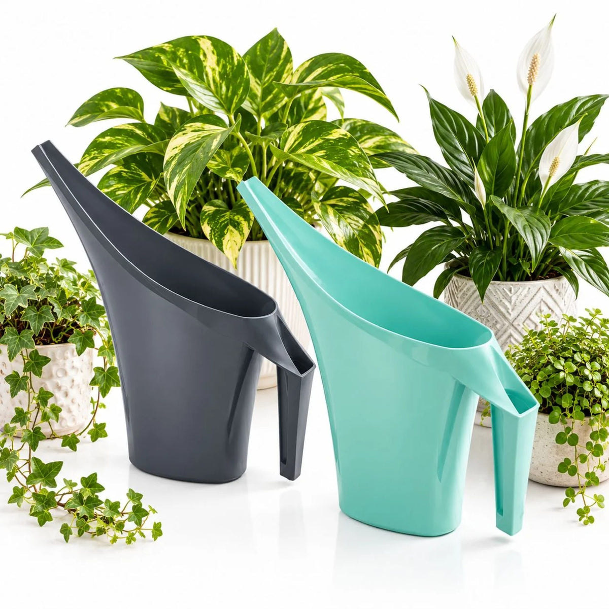 two watering cans green and black