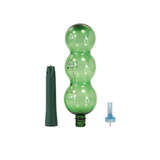 Green glass water bottle with accessories on a white background