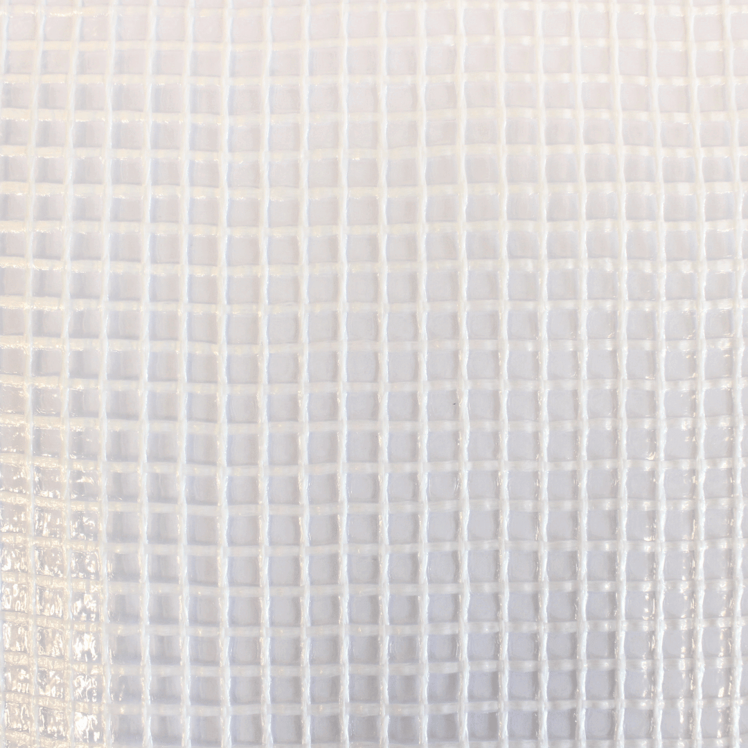 Close-up of a textured white surface with a grid pattern polythene