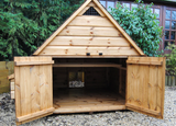 Chicken Poultry coop with doors open, made from wood with pointed roof in garden