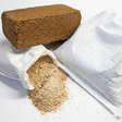 Coconut coir block with a white cloth and coconut fiber on a white background