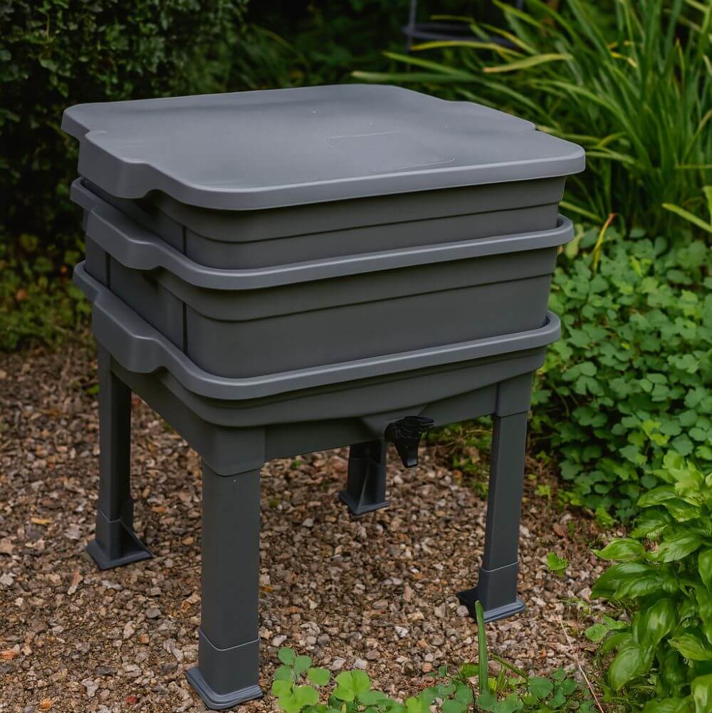 wormery stood in garden, 3 trays