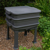 wormery stood in garden, 3 trays